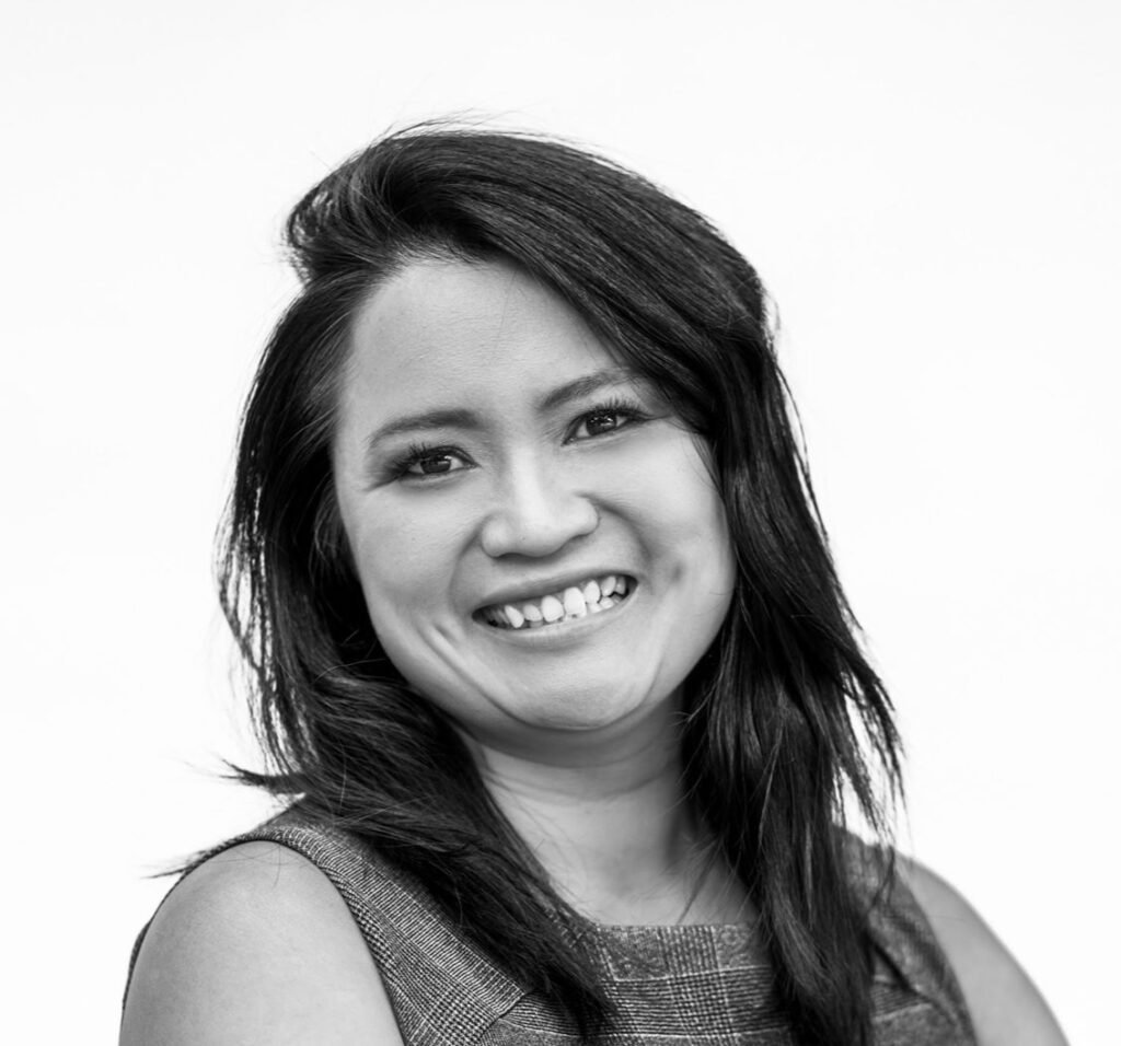 Portrait de Leslie Tran, courtière immobilière résidentielle en Estrie, spécialisée dans la vente de terrains et maisons.